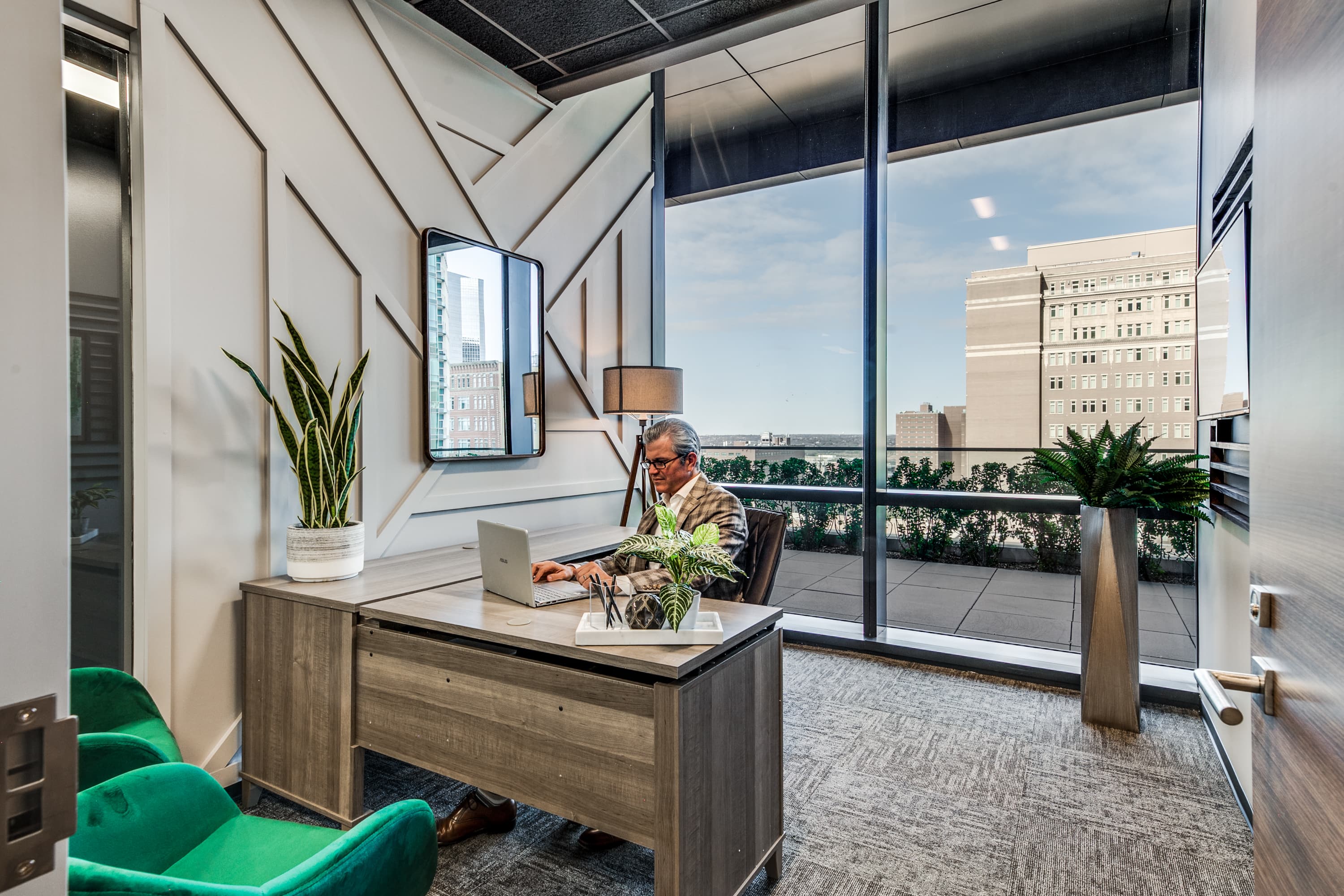 Man working in Medium Size Office with Custom Decor